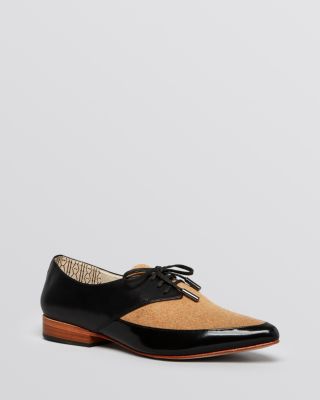 pointed toe lace up flats