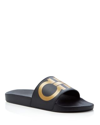 black and gold ferragamo slides