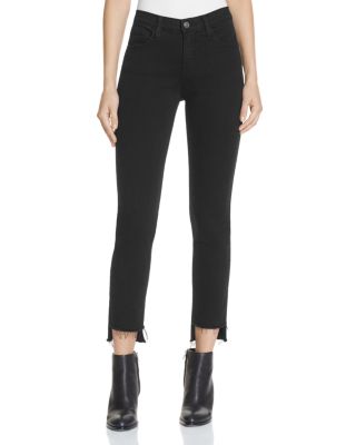 Flying Monkey Step Hem Skinny Jeans in Black