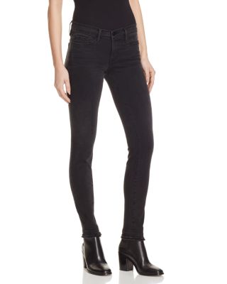 FRAME Skinny De Jeanne Double Raw Jeans in Whittier